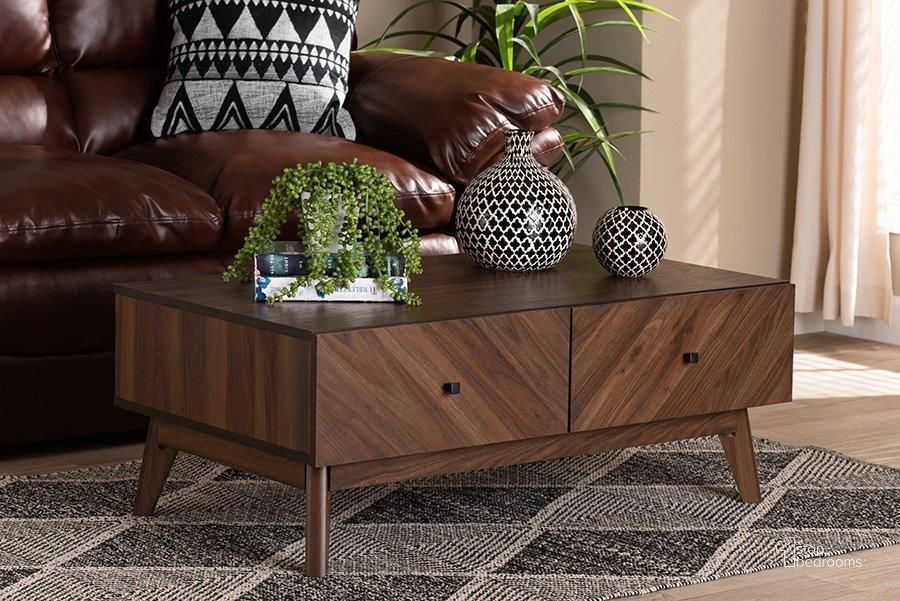The appearance of Baxton Studio Hartman Mid-Century Modern Walnut Brown Finished Wood Coffee Table designed by Baxton Studio in the transitional interior design. This walnut brown piece of furniture  was selected by 1StopBedrooms from Hartman Collection to add a touch of cosiness and style into your home. Sku: LV23CFT23140WI-Columbia-CT. Product Type: Coffee Table. Material: MDF. Image1