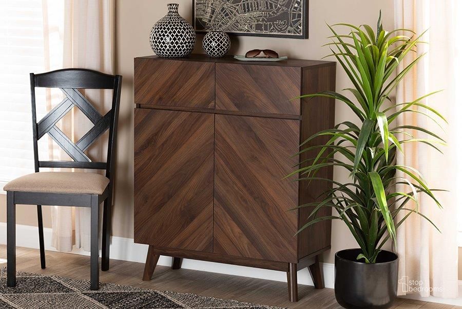 The appearance of Baxton Studio Hartman Mid-Century Modern Walnut Brown Finished Wood Shoe Cabinet designed by Baxton Studio in the transitional interior design. This walnut brown piece of furniture  was selected by 1StopBedrooms from Hartman Collection to add a touch of cosiness and style into your home. Sku: LV23SC23150WI-Columbia-Shoe Cabinet. Material: MDF. Product Type: Shoe Cabinet. Image1
