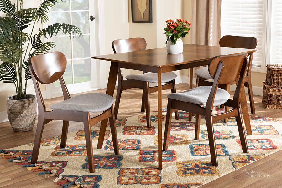 The appearance of Baxton Studio Katya Mid-Century Modern Grey Fabric Upholstered And Walnut Brown Finished Wood 5-Piece Dining Set designed by Baxton Studio in the transitional interior design. This walnut brown piece of furniture  was selected by 1StopBedrooms from Katya Collection to add a touch of cosiness and style into your home. Sku: RH378C-Grey/Walnut-5PC Dining Set. Material: Wood. Product Type: Dining Room Set. Image1