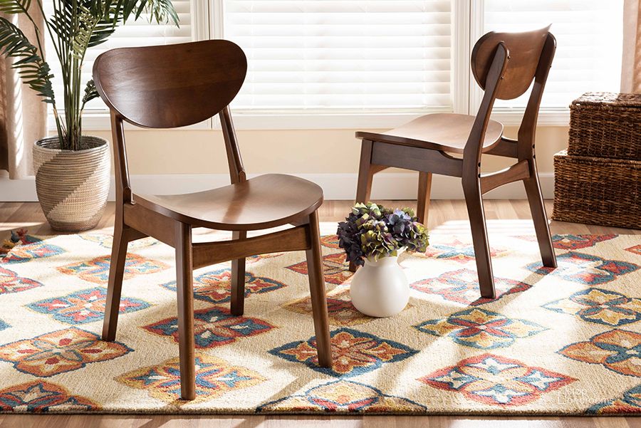 The appearance of Baxton Studio Katya Mid-Century Modern Walnut Brown Finished Wood 2-Piece Dining Chair Set designed by Baxton Studio in the transitional interior design. This walnut brown piece of furniture  was selected by 1StopBedrooms from Katya Collection to add a touch of cosiness and style into your home. Sku: RH378C-Walnut Bent Seat-DC-2PK. Material: Wood. Product Type: Dining Chair. Image1