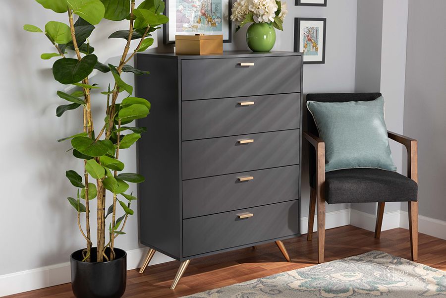 The appearance of Baxton Studio Kelson Modern And Contemporary Dark Grey And Gold Finished Wood 5-Drawer Chest designed by Baxton Studio in the modern / contemporary interior design. This dark grey piece of furniture  was selected by 1StopBedrooms from Kelson Collection to add a touch of cosiness and style into your home. Sku: LV19COD1923-Dark Grey-5DW-Chest. Product Type: Chest. Material: MDF. Image1