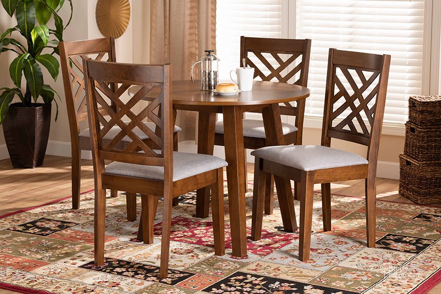 The appearance of Baxton Studio Lilly Modern and Contemporary Grey Fabric Upholstered and Walnut Brown Finished Wood 5-Piece Dining Set designed by Baxton Studio in the modern / contemporary interior design. This grey and walnut piece of furniture  was selected by 1StopBedrooms from Lilly Collection to add a touch of cosiness and style into your home. Sku: Lilly-Grey/Walnut-5PC Dining Set. Product Type: Dining Room Set. Material: Rubberwood. Image1