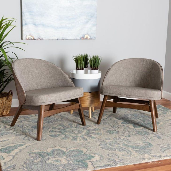 The appearance of Baxton Studio Lovella Mid-Century Modern Grey Fabric And Walnut Brown Finished Wood 2-Piece Accent Chair Set designed by Baxton Studio in the transitional interior design. This grey piece of furniture  was selected by 1StopBedrooms from Lovella Collection to add a touch of cosiness and style into your home. Sku: Lovella-Walnut-CC. Product Type: Accent Chair. Material: Rubberwood. Image1