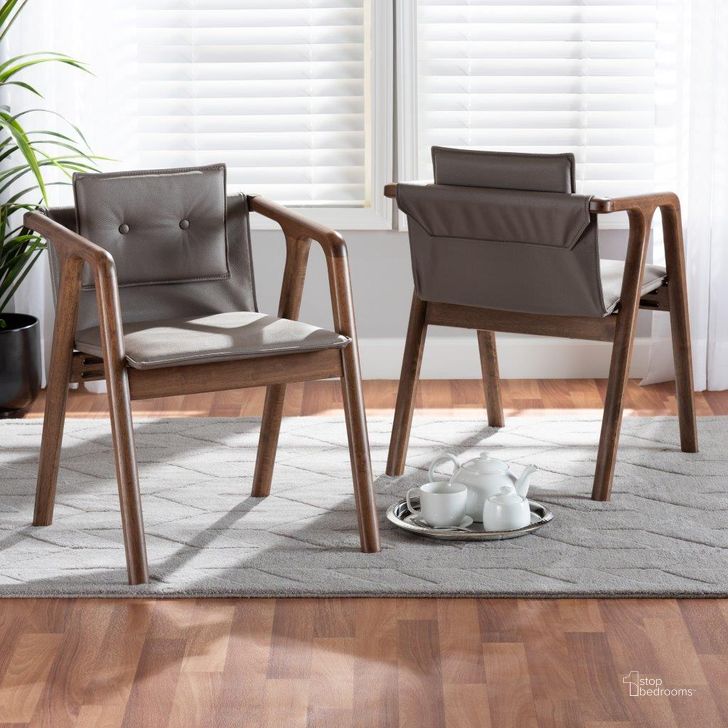The appearance of Baxton Studio Marcena Mid-Century Modern Grey Imitation Leather Upholstered and Walnut Brown Finished Wood 2-Piece Dining Chair Set designed by Baxton Studio in the transitional interior design. This grey and walnut piece of furniture  was selected by 1StopBedrooms from Marcena Collection to add a touch of cosiness and style into your home. Sku: RDC828-Grey/Walnut-DC. Material: Fabric. Product Type: Dining Chair. Image1