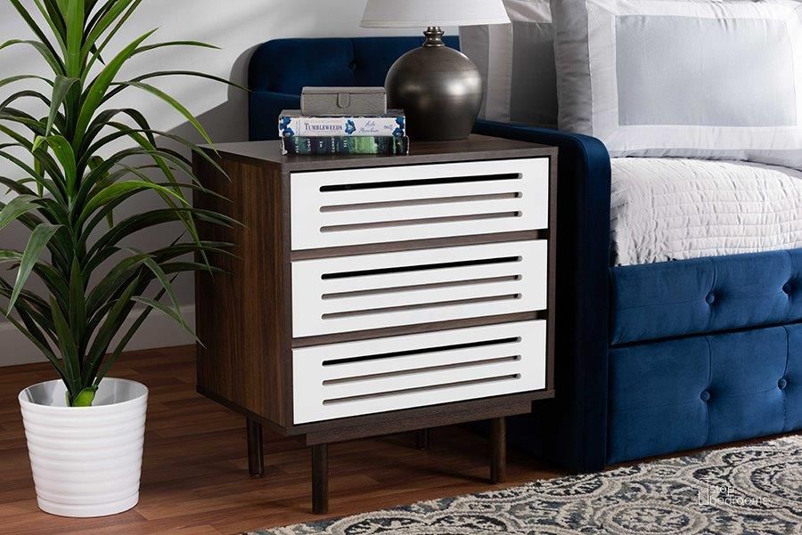The appearance of Baxton Studio Meike Mid-Century Modern Two-Tone Walnut Brown and White Finished Wood 3-Drawer Nightstand designed by Baxton Studio in the transitional interior design. This walnut and white piece of furniture  was selected by 1StopBedrooms from Meike Collection to add a touch of cosiness and style into your home. Sku: LV14COD14230WI-Columbia/White-3DW-Nightstand. Material: Wood. Product Type: Nightstand. Image1