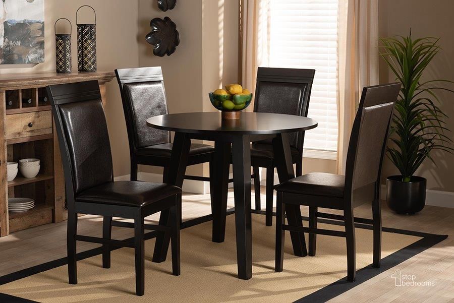 The appearance of Baxton Studio Miya Modern and Contemporary Dark Brown Faux Leather Upholstered and Dark Brown Finished Wood 5-Piece Dining Set designed by Baxton Studio in the modern / contemporary interior design. This dark brown piece of furniture  was selected by 1StopBedrooms from Miya Collection to add a touch of cosiness and style into your home. Sku: Miya-Dark Brown-5PC Dining Set. Product Type: Dining Room Set. Material: Rubberwood. Image1