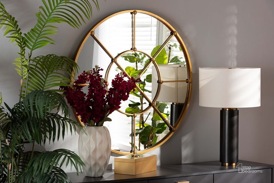 The appearance of Baxton Studio Ohara Modern And Contemporary Gold Finished Metal Accent Wall Mirror designed by Baxton Studio in the modern / contemporary interior design. This gold piece of furniture  was selected by 1StopBedrooms from Ohara Collection to add a touch of cosiness and style into your home. Sku: RXW-10394-Gold. Product Type: Mirror. Material: MDF. Image1
