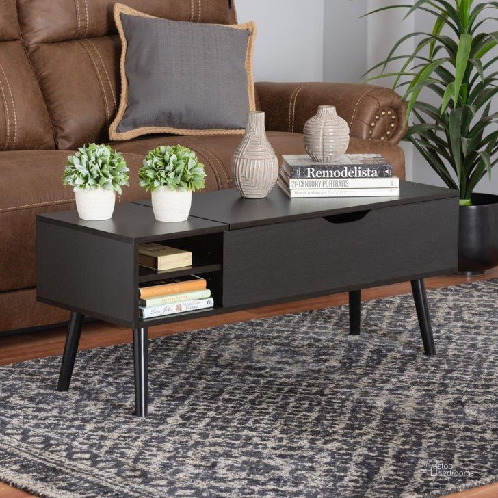 The appearance of Baxton Studio Roden Modern Two-Tone Black And Espresso Brown Finished Wood Coffee Table With Lift-Top Storage Compartment designed by Baxton Studio in the modern / contemporary interior design. This dark brown and black piece of furniture  was selected by 1StopBedrooms from Roden Collection to add a touch of cosiness and style into your home. Sku: LCF20211257-Wenge-CT. Material: Wood. Product Type: Coffee Table. Image1