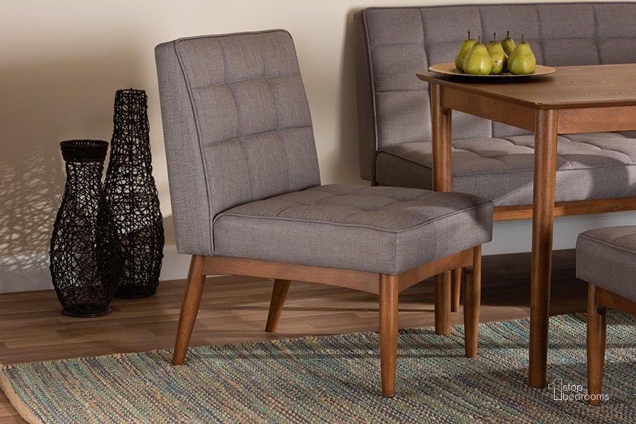 The appearance of Baxton Studio Sanford Mid-Century Modern Grey Fabric Upholstered and Walnut Brown Finished Wood Dining Chair designed by Baxton Studio in the transitional interior design. This grey piece of furniture  was selected by 1StopBedrooms from Sanford Collection to add a touch of cosiness and style into your home. Sku: BBT8051.11-Grey/Walnut-CC. Product Type: Dining Chair. Material: MDF. Image1