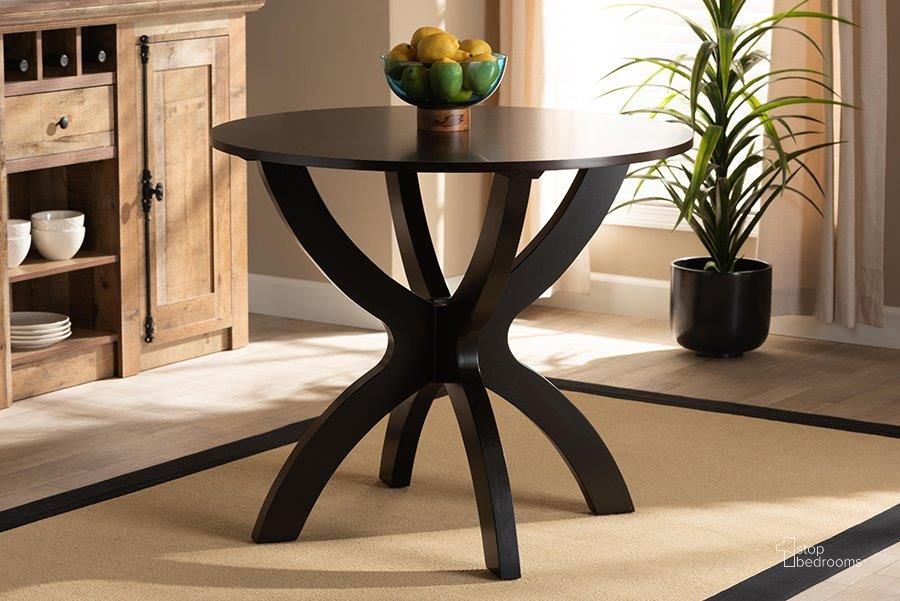 The appearance of Baxton Studio Tilde Modern and Contemporary Dark Brown Finished 35-Inch-Wide Round Wood Dining Table designed by Baxton Studio in the modern / contemporary interior design. This dark brown piece of furniture  was selected by 1StopBedrooms from Tilde Collection to add a touch of cosiness and style into your home. Sku: RH7232T-Dark Brown-35-IN-DT. Table Base Style: Trestle. Table Top Shape: Round. Product Type: Dining Table. Material: MDF. Size: 35". Image1