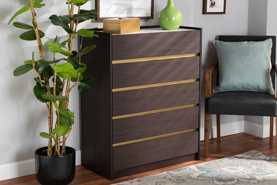 The appearance of Baxton Studio Walker Modern And Contemporary Dark Brown And Gold Finished Wood 5-Drawer Chest With Faux Marble Top designed by Baxton Studio in the modern / contemporary interior design. This dark brown piece of furniture  was selected by 1StopBedrooms from Walker Collection to add a touch of cosiness and style into your home. Sku: LV25COD25230-Modi Wenge/Marble-5DW-Chest. Product Type: Chest. Material: MDF. Image1