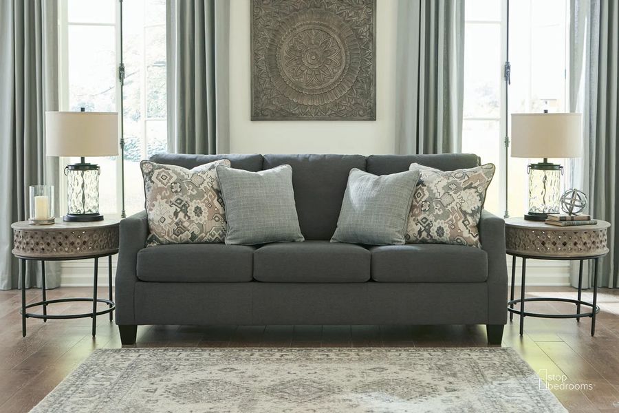 The appearance of Bayonne Sofa In Charcoal designed by Signature Design by Ashley in the modern / contemporary interior design. This charcoal piece of furniture  was selected by 1StopBedrooms from Bayonne Collection to add a touch of cosiness and style into your home. Sku: 3780138. Material: Fabric. Product Type: Sofa. Image1