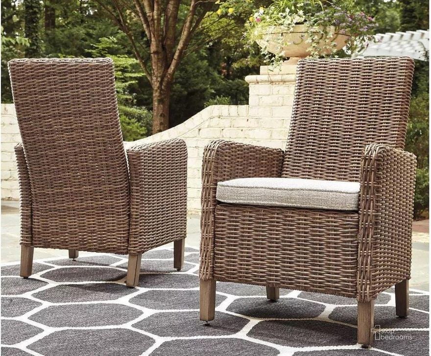 The appearance of Beachcroft Beige Arm Chair with Cushion Set of 2 designed by Signature Design by Ashley in the transitional interior design. This beige piece of furniture  was selected by 1StopBedrooms from Beachcroft Collection to add a touch of cosiness and style into your home. Sku: P791-601A. Material: Fabric. Product Type: Outdoor Chair. Image1