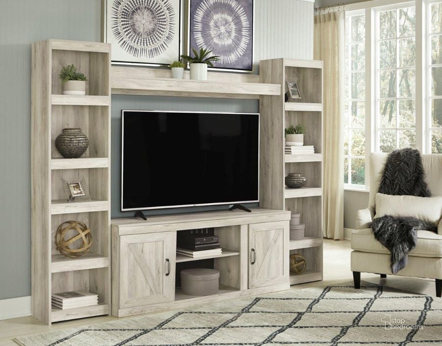 The appearance of Bellaby Whitewash 4 Piece Entertainment Wall designed by Signature Design by Ashley in the transitional interior design. This white wash piece of furniture  was selected by 1StopBedrooms from Bellaby Collection to add a touch of cosiness and style into your home. Sku: EW0331-268;EW0331-124;EW0331-124;EW0331-127. Material: Wood. Product Type: Entertainment Centers and Wall. Image1