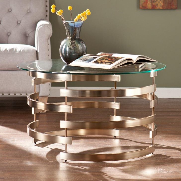 The appearance of Belmar Cocktail Table designed by SEI Furniture in the modern / contemporary interior design. This champagne piece of furniture  was selected by 1StopBedrooms from Belmar Collection to add a touch of cosiness and style into your home. Sku: CK5430. Material: Glass. Product Type: Cocktail Table. Image1