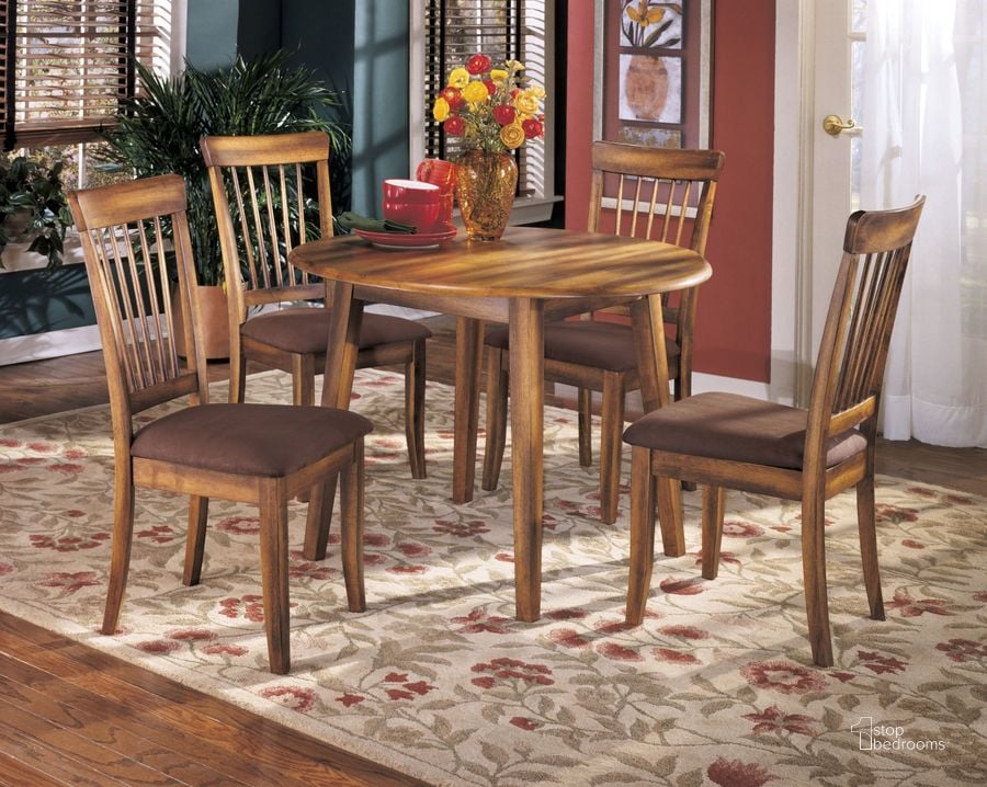 The appearance of Berringer Drop Leaf Dinette Set designed by Signature Design by Ashley in the transitional interior design. This rustic brown piece of furniture  was selected by 1StopBedrooms from Berringer Collection to add a touch of cosiness and style into your home. Sku: D199-15;D199-01. Table Base Style: Legs. Table Top Shape: Round. Material: Wood. Product Type: Dining Room Set. Image1