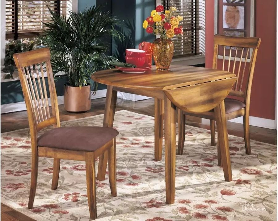 The appearance of Berringer Drop Leaf Table designed by Signature Design by Ashley in the transitional interior design. This rustic brown piece of furniture  was selected by 1StopBedrooms from Berringer Collection to add a touch of cosiness and style into your home. Sku: D199-15. Table Base Style: Legs. Table Top Shape: Round. Material: Wood. Product Type: Dining Table. Image1
