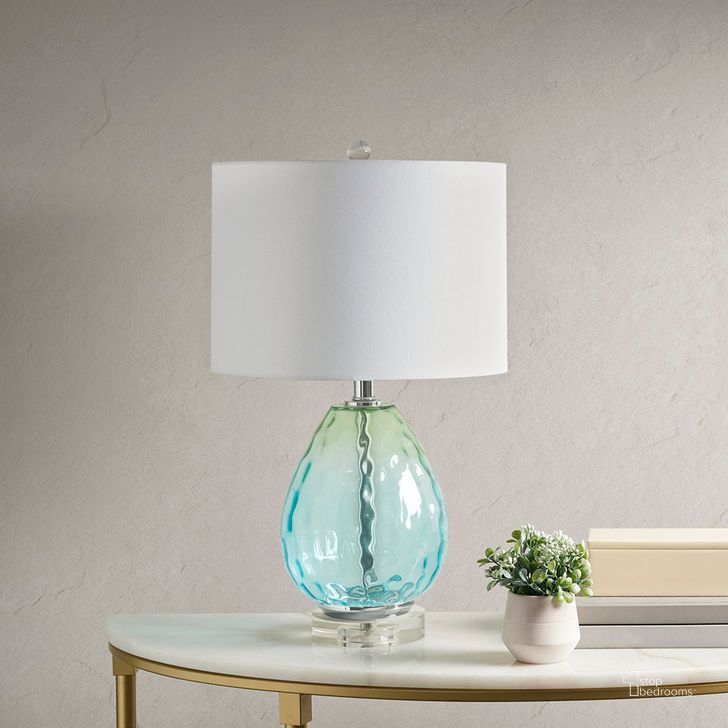 The appearance of Borel Table Lamp In Blue designed by Olliix in the  interior design. This blue piece of furniture  was selected by 1StopBedrooms from Borel Collection to add a touch of cosiness and style into your home. Sku: UH153-0057. Material: Cotton. Product Type: Table Lamp. Image1