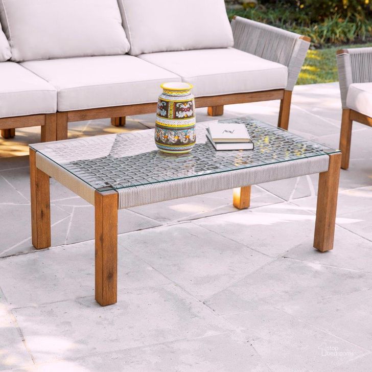 The appearance of Brendina Outdoor Glass-Top Cocktail Table designed by SEI Furniture in the modern / contemporary interior design. This natural piece of furniture  was selected by 1StopBedrooms from Brendina Collection to add a touch of cosiness and style into your home. Sku: OD1089300. Material: Glass. Product Type: Outdoor Table. Image1