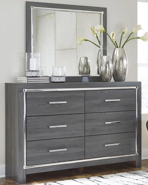 The appearance of Broad Marsh Gray Dresser and Mirror designed by Boho House in the modern / contemporary interior design. This gray piece of furniture  was selected by 1StopBedrooms from Broad Marsh Collection to add a touch of cosiness and style into your home. Sku: B214-31;B214-36. Material: Wood. Product Type: Dresser and Mirror. Image1