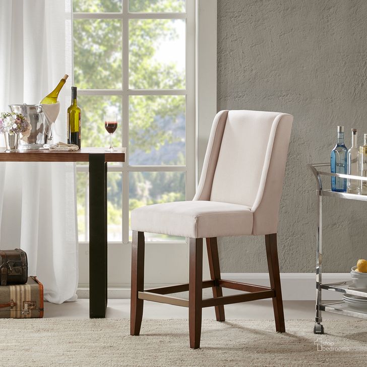 The appearance of Brody Wing Counter Stool In Cream designed by Olliix in the modern / contemporary interior design. This cream piece of furniture  was selected by 1StopBedrooms from Brody Collection to add a touch of cosiness and style into your home. Sku: MP104-0040. Material: Wood. Product Type: Barstool. Image1