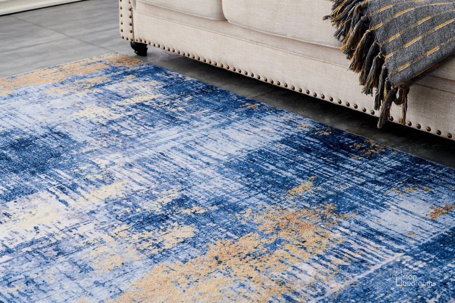 The appearance of Broly Blue/Gold Area Rug 0qb24536736 designed by Artisan Elegance in the modern / contemporary interior design. This blue/gold piece of furniture  was selected by 1StopBedrooms from Broly Collection to add a touch of cosiness and style into your home. Sku: ZP1026-710. Material: Polyester. Product Type: Area Rugs. Image1