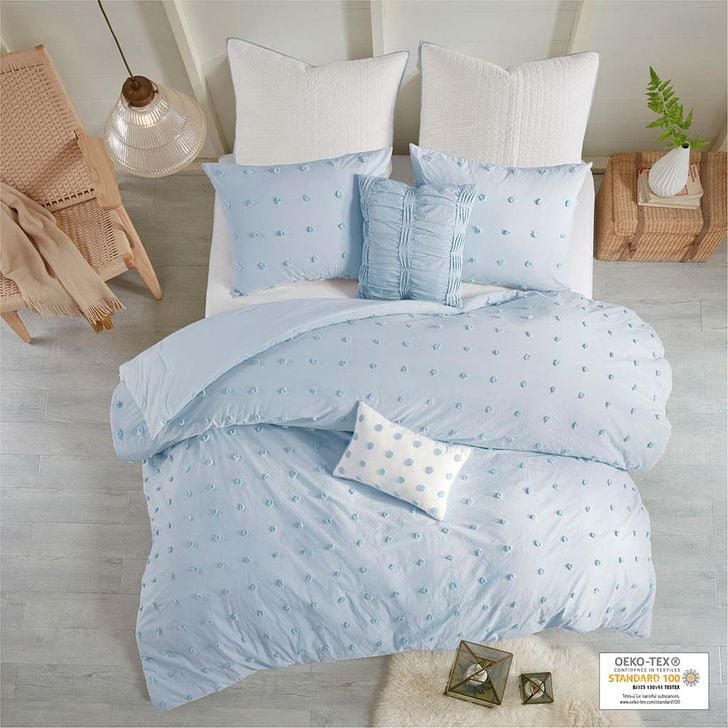The appearance of Brooklyn Cotton Jaquard 5Pcs Twin Comforter Set With All Over Woven Cotton Dots In Blue designed by Olliix in the modern / contemporary interior design. This blue piece of furniture  was selected by 1StopBedrooms from Brooklyn Collection to add a touch of cosiness and style into your home. Sku: UH10-2153. Material: Polyester. Bed Size: Twin. Product Type: Comforter Set. Image1