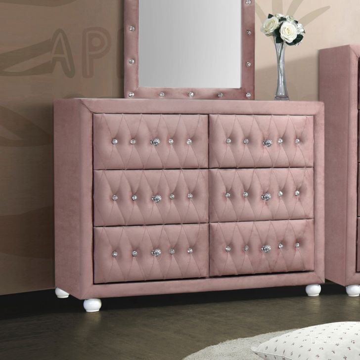 The appearance of Buscomb Pink Kid Dresser Kid Room designed by Off 5th Home in the transitional interior design. This pink piece of furniture  was selected by 1StopBedrooms from Buscomb Collection to add a touch of cosiness and style into your home. Sku: 30825. Material: Wood. Product Type: Kids Dresser. Image1