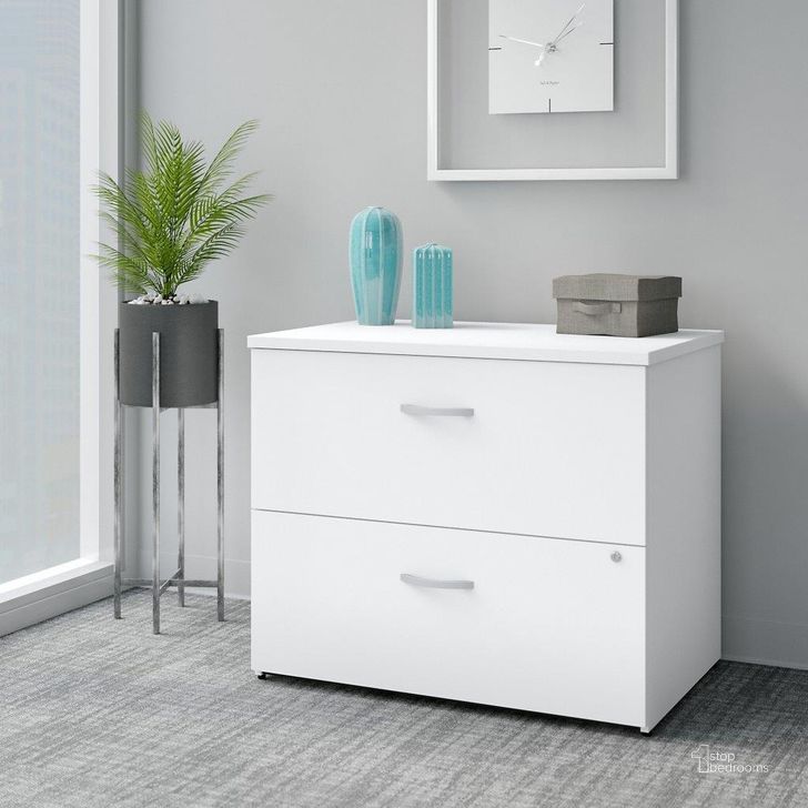 The appearance of Bush Business Furniture Easy Office 2 Drawer Lateral File Cabinet in Pure White designed by Bush Furniture in the modern / contemporary interior design. This white piece of furniture  was selected by 1StopBedrooms from Easy Office Collection to add a touch of cosiness and style into your home. Sku: EO109WHSU. Material: Wood. Product Type: Lateral Filing Cabinet. Image1