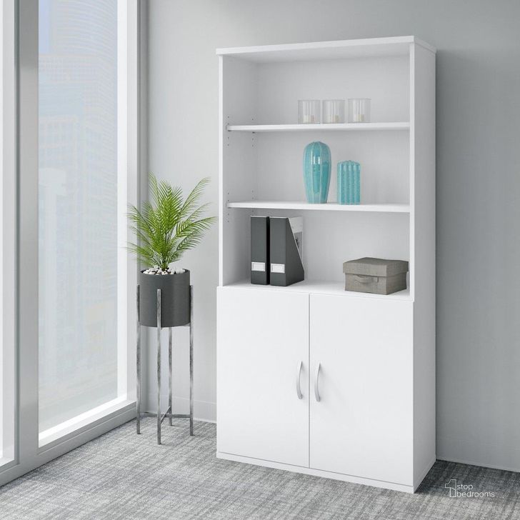 The appearance of Bush Business Furniture Easy Office 5 Shelf Bookcase with Doors in Pure White designed by Bush Furniture in the transitional interior design. This white piece of furniture  was selected by 1StopBedrooms from Easy Office Collection to add a touch of cosiness and style into your home. Sku: EO106WH. Material: Wood. Product Type: Bookcase. Image1