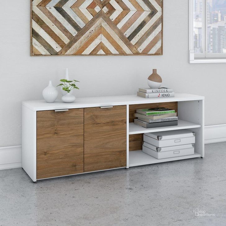 The appearance of Bush Business Furniture Jamestown Low Storage Cabinet with Doors and Shelves in White and Fresh Walnut designed by Bush Furniture in the modern / contemporary interior design. This walnut and white piece of furniture  was selected by 1StopBedrooms from Jamestown Collection to add a touch of cosiness and style into your home. Sku: JTS160FWWH. Product Type: Storage Cabinet. Image1