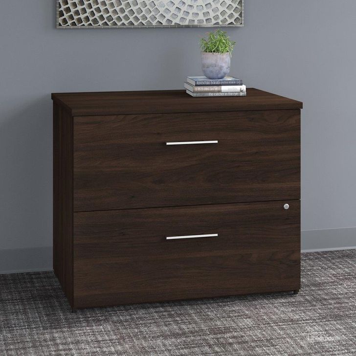 The appearance of Bush Business Furniture Office 500 36W 2 Drawer Lateral File Cabinet in Black Walnut designed by Bush Furniture in the modern / contemporary interior design. This black walnut piece of furniture  was selected by 1StopBedrooms from Office 500 Collection to add a touch of cosiness and style into your home. Sku: OFF136BWSU. Product Type: Lateral Filing Cabinet. Image1
