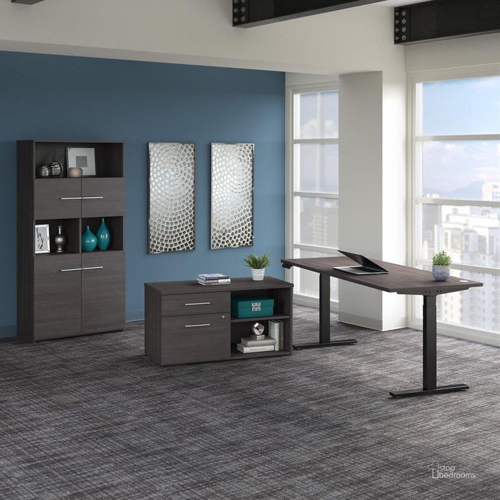 The appearance of Bush Business Furniture Office 500 72W Height Adjustable Standing Desk with Storage and Bookcase in Storm Gray designed by Bush Furniture in the modern / contemporary interior design. This gray piece of furniture  was selected by 1StopBedrooms from Office 500 Collection to add a touch of cosiness and style into your home. Sku: OF5006SGSU. Product Type: Desk. Image1