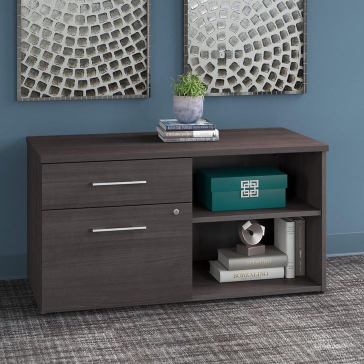 The appearance of Bush Business Furniture Office 500 Low Storage Cabinet with Drawers and Shelves in Storm Gray designed by Bush Furniture in the modern / contemporary interior design. This gray piece of furniture  was selected by 1StopBedrooms from Office 500 Collection to add a touch of cosiness and style into your home. Sku: OFS145SG. Product Type: Storage Cabinet. Image1