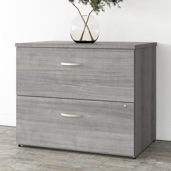 The appearance of Bush Business Furniture Studio A 2 Drawer Lateral File Cabinet in Platinum Gray designed by Bush Furniture in the transitional interior design. This gray piece of furniture  was selected by 1StopBedrooms from Studio A Collection to add a touch of cosiness and style into your home. Sku: SDF136PGSU-Z. Product Type: Lateral Filing Cabinet. Image1