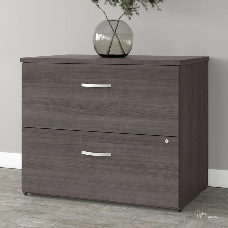 The appearance of Bush Business Furniture Studio A 2 Drawer Lateral File Cabinet in Storm Gray designed by Bush Furniture in the modern / contemporary interior design. This dark gray piece of furniture  was selected by 1StopBedrooms from Studio A Collection to add a touch of cosiness and style into your home. Sku: SDF136SGSU-Z. Product Type: Lateral Filing Cabinet. Image1