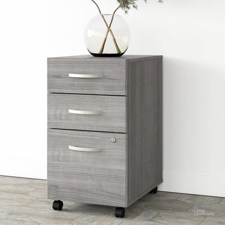 The appearance of Bush Business Furniture Studio A 3 Drawer Mobile File Cabinet in Platinum Gray designed by Bush Furniture in the modern / contemporary interior design. This gray piece of furniture  was selected by 1StopBedrooms from Studio A Collection to add a touch of cosiness and style into your home. Sku: SDF216PGSU-Z. Product Type: Mobile Filing Cabinet. Image1