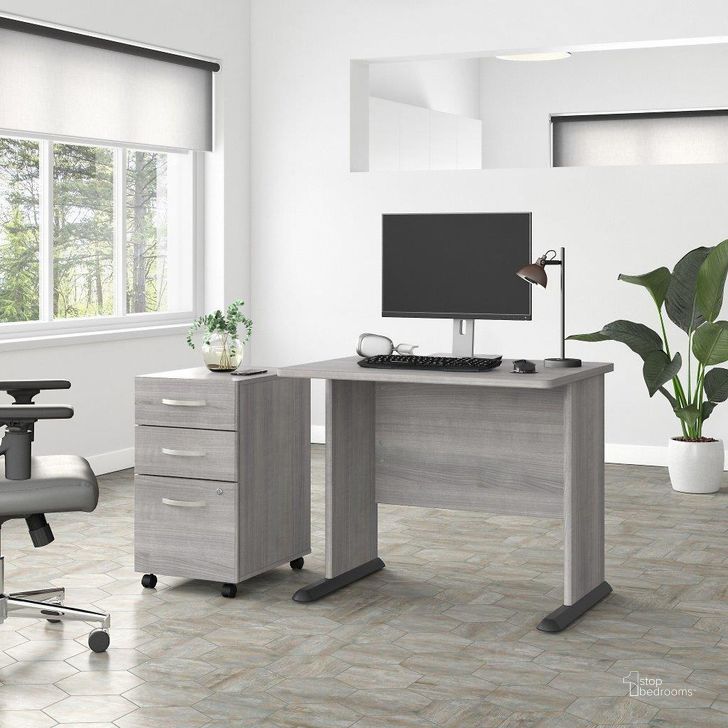 The appearance of Bush Business Furniture Studio A 36W Small Computer Desk with 3 Drawer Mobile File Cabinet in Platinum Gray designed by Bush Furniture in the transitional interior design. This gray piece of furniture  was selected by 1StopBedrooms from Studio A Collection to add a touch of cosiness and style into your home. Sku: STA005PGSU. Product Type: Computer Desk. Image1