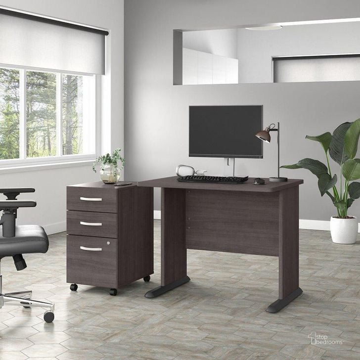 The appearance of Bush Business Furniture Studio A 36W Small Computer Desk with 3 Drawer Mobile File Cabinet in Storm Gray designed by Bush Furniture in the transitional interior design. This dark gray piece of furniture  was selected by 1StopBedrooms from Studio A Collection to add a touch of cosiness and style into your home. Sku: STA005SGSU. Product Type: Computer Desk. Image1