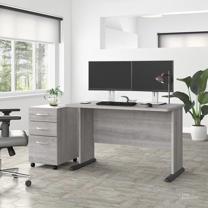 The appearance of Bush Business Furniture Studio A 48W Computer Desk with 3 Drawer Mobile File Cabinet in Platinum Gray designed by Bush Furniture in the transitional interior design. This gray piece of furniture  was selected by 1StopBedrooms from Studio A Collection to add a touch of cosiness and style into your home. Sku: STA001PGSU. Product Type: Computer Desk. Image1