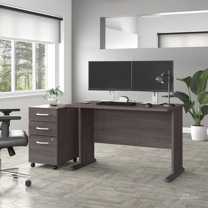 The appearance of Bush Business Furniture Studio A 48W Computer Desk with 3 Drawer Mobile File Cabinet in Storm Gray designed by Bush Furniture in the transitional interior design. This dark gray piece of furniture  was selected by 1StopBedrooms from Studio A Collection to add a touch of cosiness and style into your home. Sku: STA001SGSU. Product Type: Computer Desk. Image1