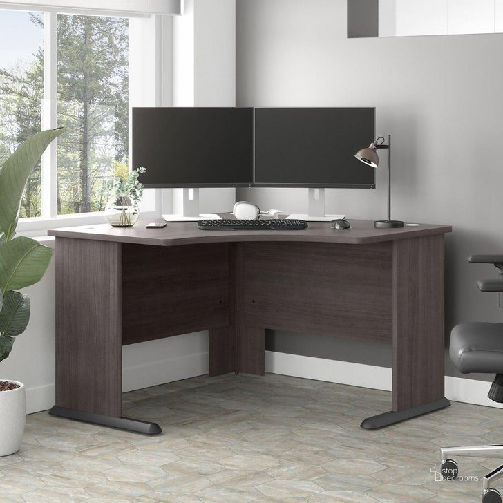 The appearance of Bush Business Furniture Studio A 48W Corner Computer Desk in Storm Gray designed by Bush Furniture in the modern / contemporary interior design. This dark gray piece of furniture  was selected by 1StopBedrooms from Studio A Collection to add a touch of cosiness and style into your home. Sku: SDD148SG. Product Type: Computer Desk. Image1