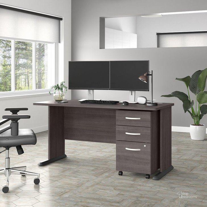 The appearance of Bush Business Furniture Studio A 60W Computer Desk with 3 Drawer Mobile File Cabinet in Storm Gray designed by Bush Furniture in the transitional interior design. This dark gray piece of furniture  was selected by 1StopBedrooms from Studio A Collection to add a touch of cosiness and style into your home. Sku: STA002SGSU. Product Type: Computer Desk. Image1