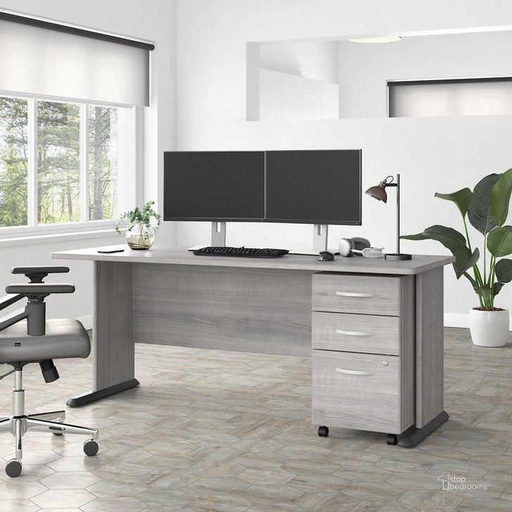 The appearance of Bush Business Furniture Studio A 72W Computer Desk with 3 Drawer Mobile File Cabinet in Platinum Gray designed by Bush Furniture in the transitional interior design. This gray piece of furniture  was selected by 1StopBedrooms from Studio A Collection to add a touch of cosiness and style into your home. Sku: STA004PGSU. Product Type: Computer Desk. Image1