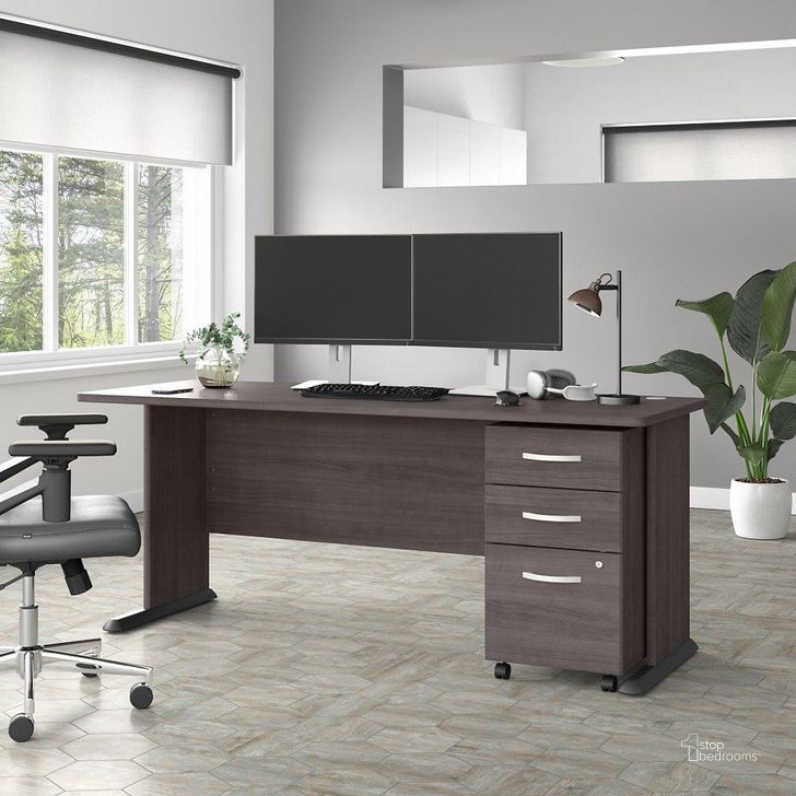 The appearance of Bush Business Furniture Studio A 72W Computer Desk with 3 Drawer Mobile File Cabinet in Storm Gray designed by Bush Furniture in the transitional interior design. This dark gray piece of furniture  was selected by 1StopBedrooms from Studio A Collection to add a touch of cosiness and style into your home. Sku: STA004SGSU. Product Type: Computer Desk. Image1