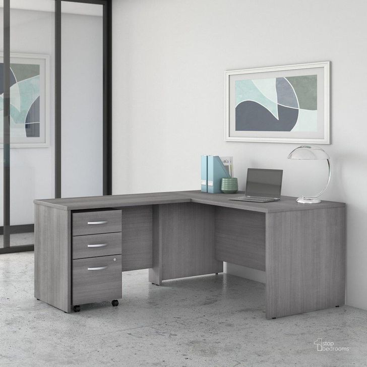 The appearance of Bush Business Furniture Studio C 60W x 30D L Shaped Desk with Mobile File Cabinet and 42W Return in Platinum Gray designed by Bush Furniture in the transitional interior design. This gray piece of furniture  was selected by 1StopBedrooms from Studio C Collection to add a touch of cosiness and style into your home. Sku: STC008PGSU. Product Type: Desk. Image1