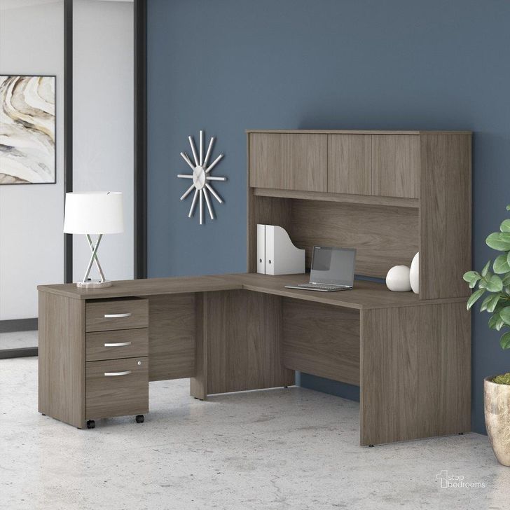 The appearance of Bush Business Furniture Studio C 72W x 30D L Shaped Desk with Hutch, Mobile File Cabinet and 42W Return in Modern Hickory designed by Bush Furniture in the transitional interior design. This hickory piece of furniture  was selected by 1StopBedrooms from Studio C Collection to add a touch of cosiness and style into your home. Sku: STC006MHSU. Product Type: Desk & Hutch. Image1
