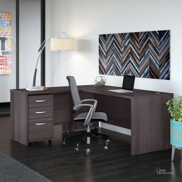 The appearance of Bush Business Furniture Studio C 72W x 30D L Shaped Desk with Mobile File Cabinet and 42W Return in Storm Gray designed by Bush Furniture in the modern / contemporary interior design. This dark gray piece of furniture  was selected by 1StopBedrooms from Studio C Collection to add a touch of cosiness and style into your home. Sku: STC007SGSU. Product Type: Desk. Image1
