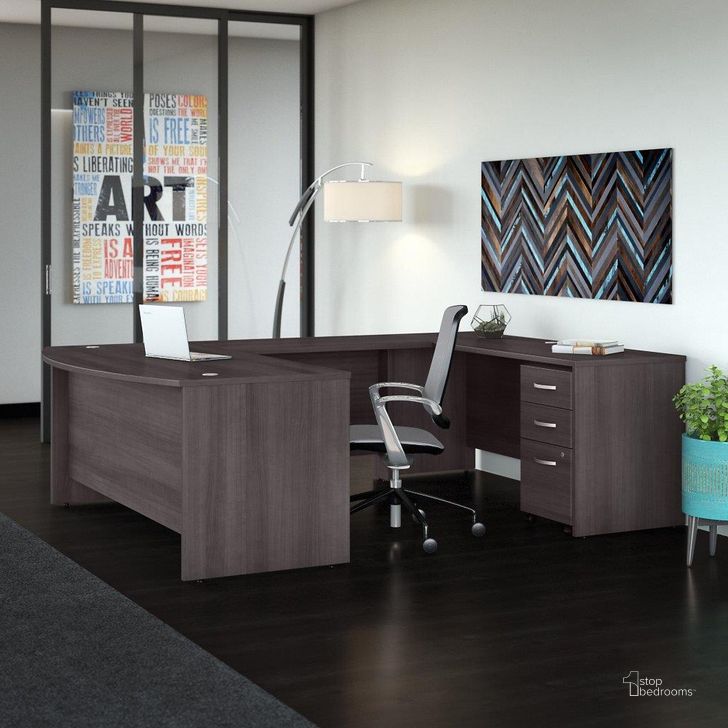 The appearance of Bush Business Furniture Studio C 72W x 36D U Shaped Desk with Mobile File Cabinet in Storm Gray designed by Bush Furniture in the transitional interior design. This dark gray piece of furniture  was selected by 1StopBedrooms from Studio C Collection to add a touch of cosiness and style into your home. Sku: STC004SGSU. Product Type: Desk. Image1