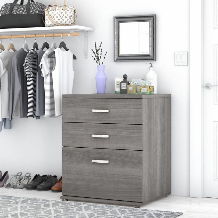 The appearance of Bush Business Furniture Universal Closet Organizer with Drawers in Platinum Gray designed by Bush Furniture in the modern / contemporary interior design. This gray piece of furniture  was selected by 1StopBedrooms from Closet Storage Collection to add a touch of cosiness and style into your home. Sku: CLS328PG-Z. Material: Wood. Product Type: Organizer. Image1